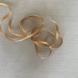 Golden tan ribbon