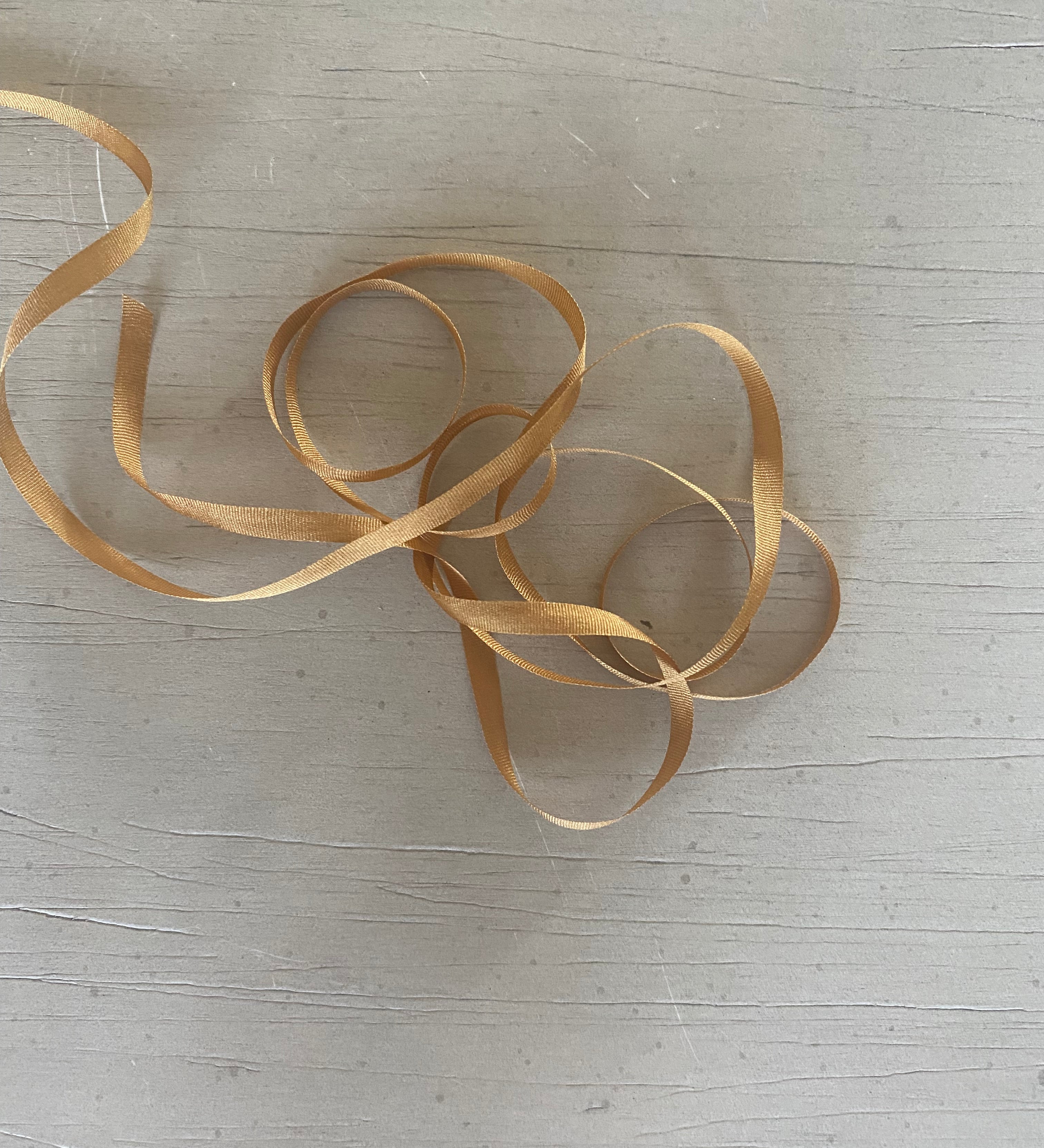 Golden tan ribbon